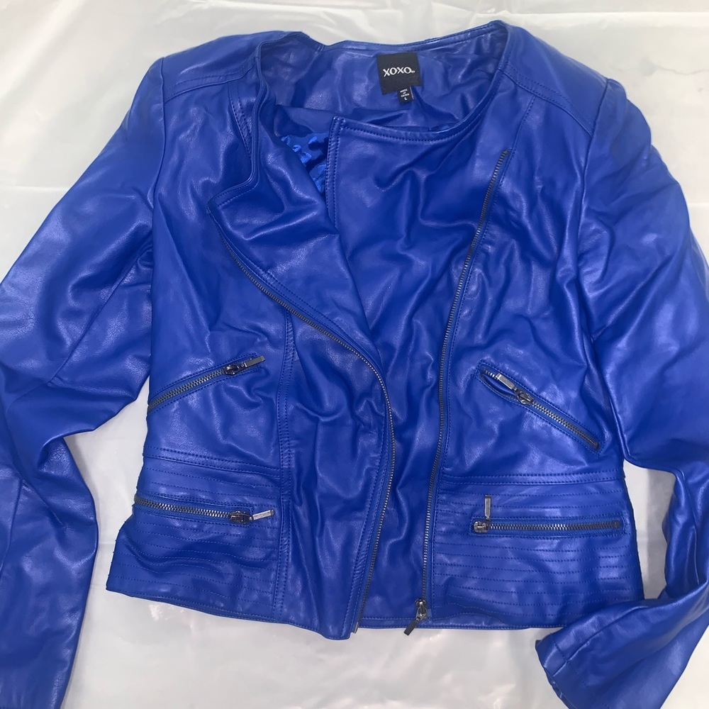 Blue faux leather jacket.